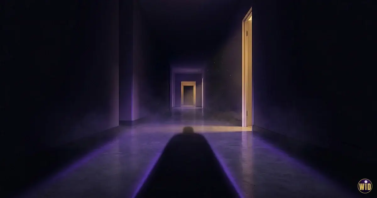 A dark corridor with a long shadow leading to a gold doorway, illustrating dreaming of being chased