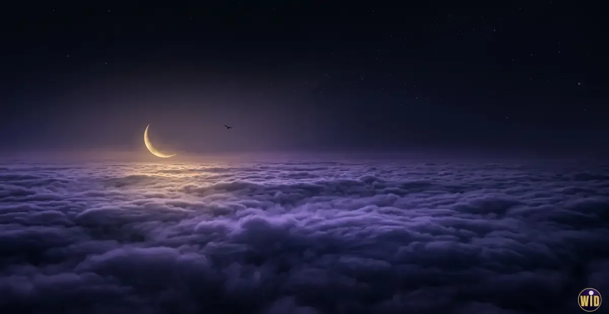 A moonlit sea of clouds seen from above at night, illustrating dreaming of flying
